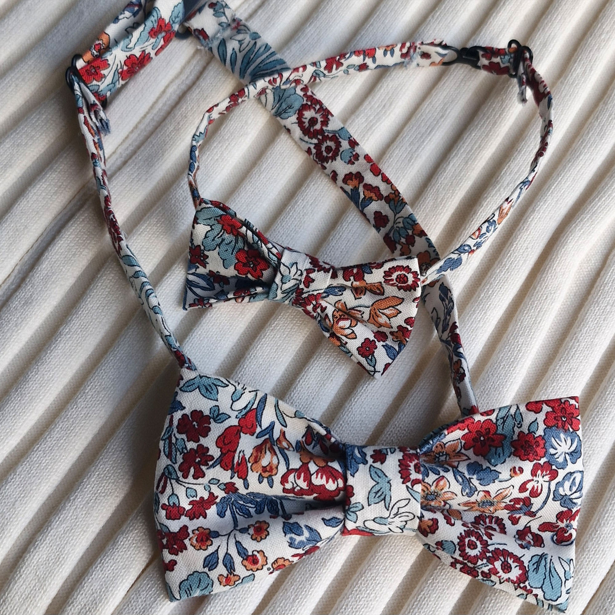 Untitled Image of a set of bowties for father and son handmade from a floral fabric